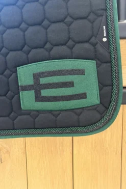 Equiline Equiline-Schabrak E-logga